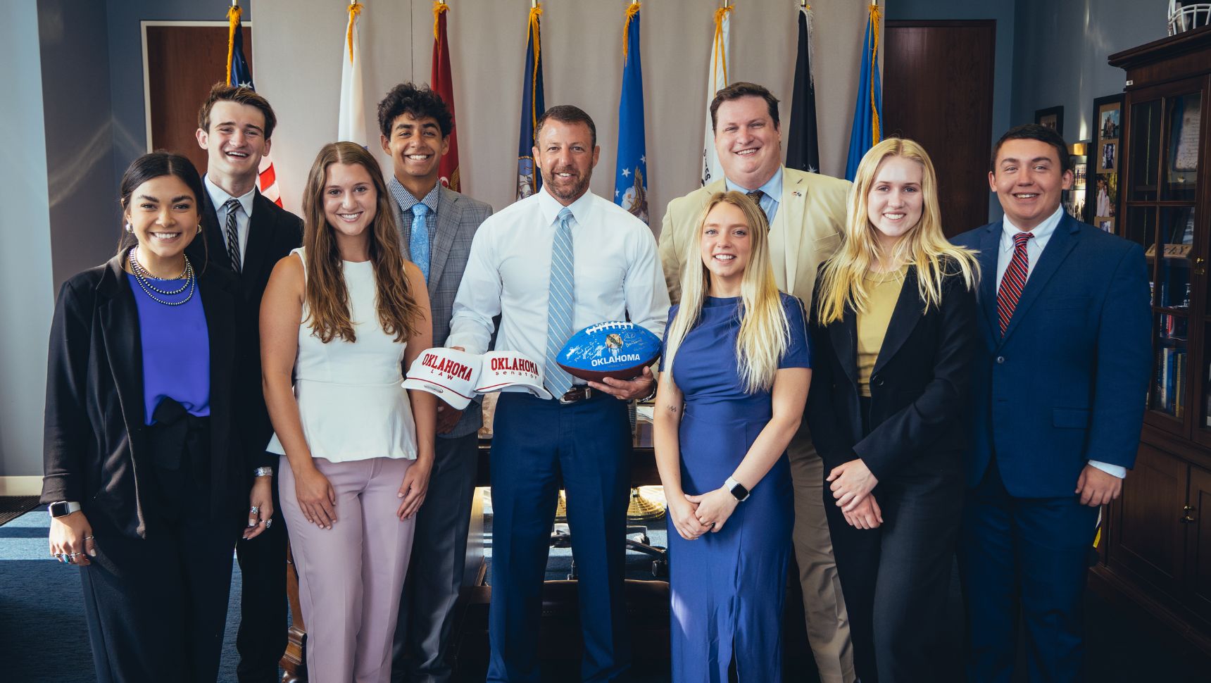 Senator Mullin posing with interns